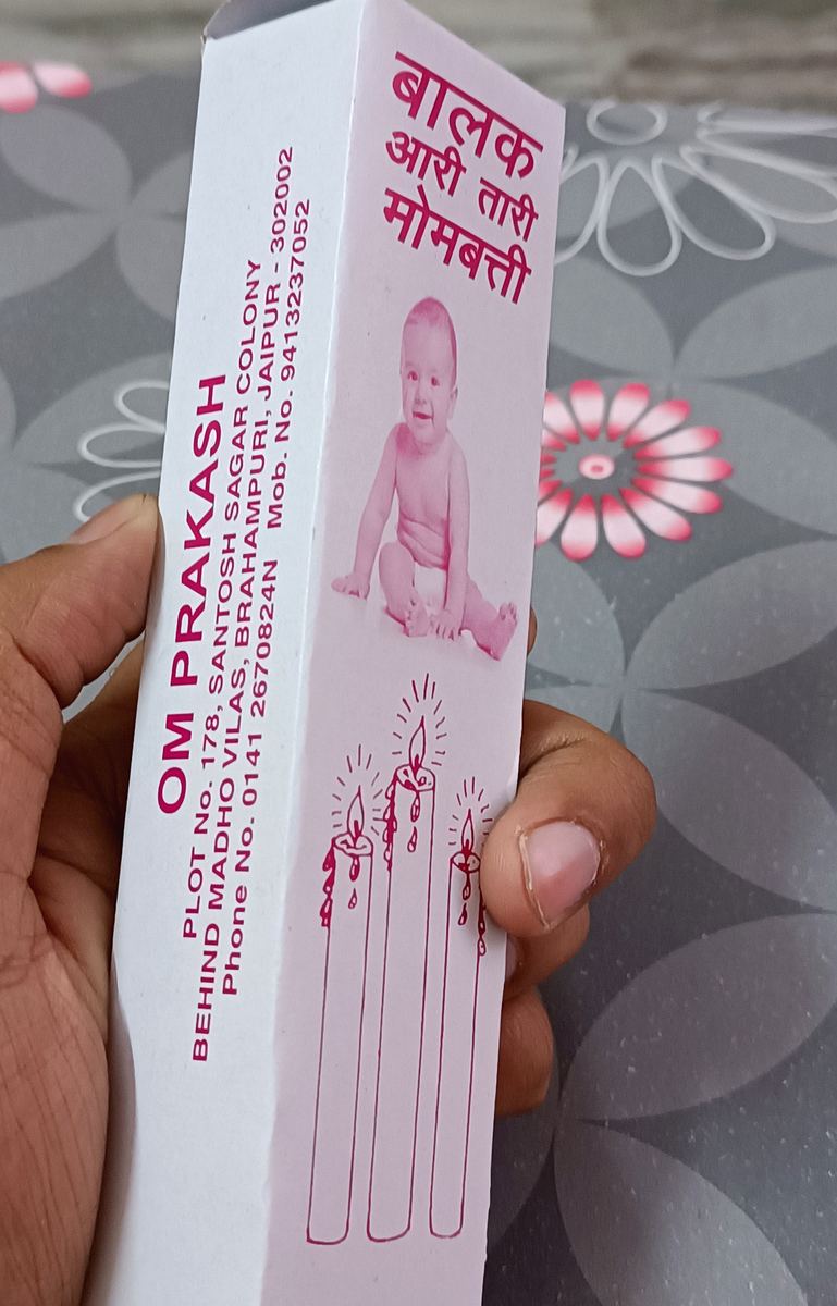 Om Prakash candle box showing the Brahampuri, Jaipur workshop address